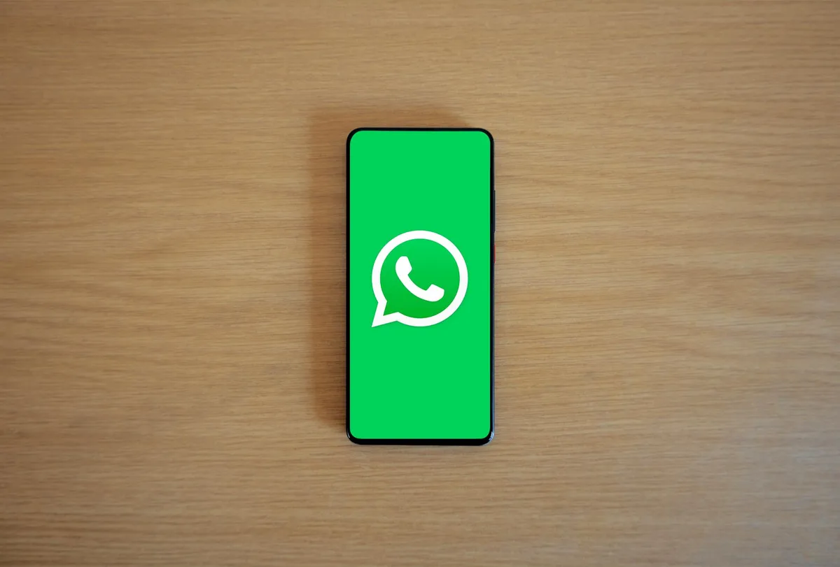 WhatsApp Business interface on a smartphone showing auto reply configuration for a Malaysian service business