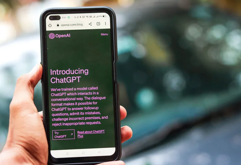 Smartphone with chat interface showing multiple conversations receiving the same message