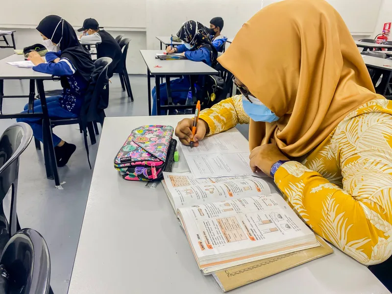 Students in a learning environment representing local service businesses in Malaysia